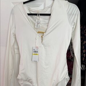 Trina Turk White Long-Sleeve V-Neck plunge paddle suit Bodysuit with Gold Accent